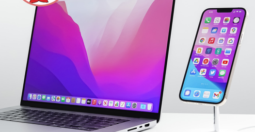 At One Hour Device Repair, the iPhone XS and XR are charging on a dock.