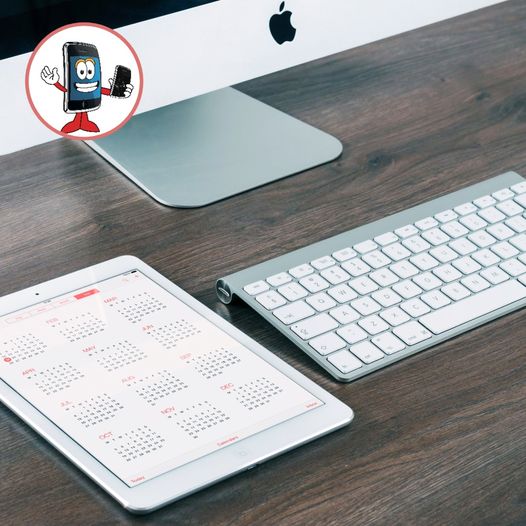 Looking for a new device Be amazed by the incredible A person's hand holding an iPad displaying a calendar app, demonstrating how to use it efficiently for scheduling and organizing tasks.